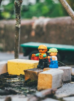 toy figurines and building blocks