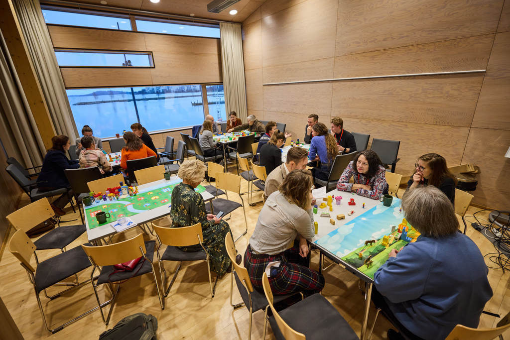 workshop participants playing the Building resilience game at Nordregio Forum