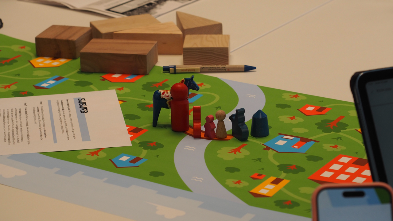 wooden blocks and play characters on a game board