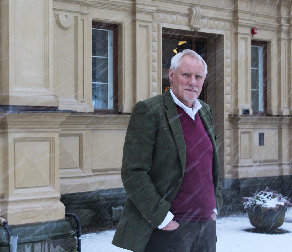 Kjell Nilsson standing in front of Nordregio, on the island of Skeppsholmen in Stockholm. Photo by Natalia Muntean.